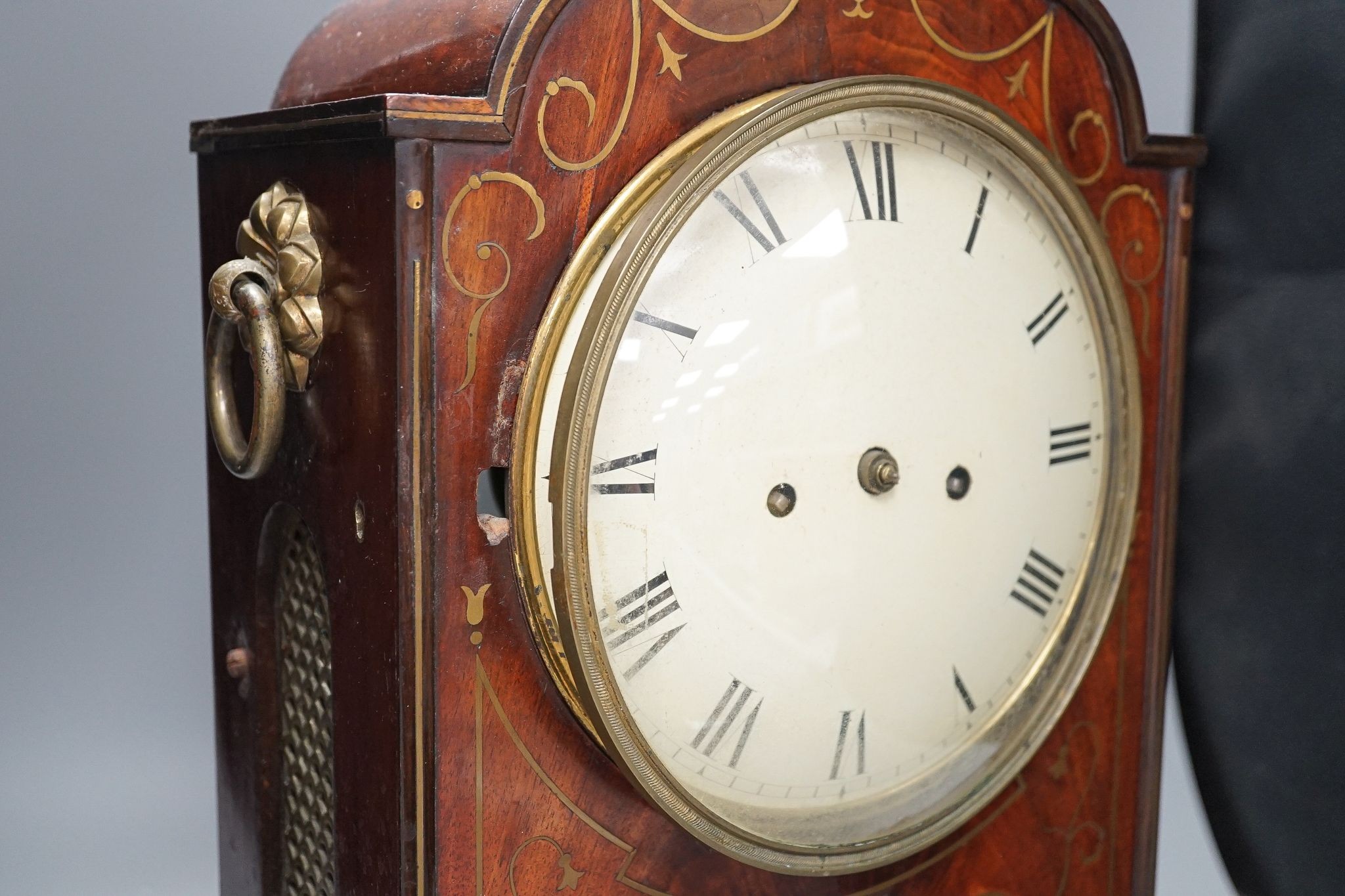 A late George III mahogany bracket clock with brass inlay, 65cm